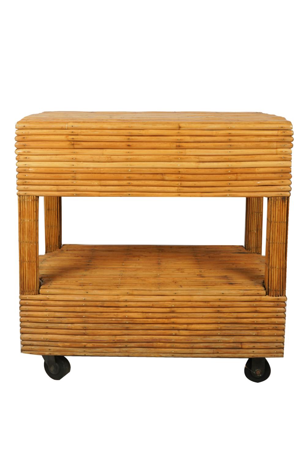 Appraisal: RATTAN TROLLEY CARTthe hinged top opening to a storage compartment