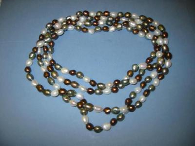 Appraisal: A RICE FRESH WATER PEARL NECKLACE comprising white bronze and