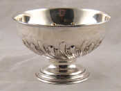 Appraisal: A sterling silver rose bowl with scrolling half fluting by