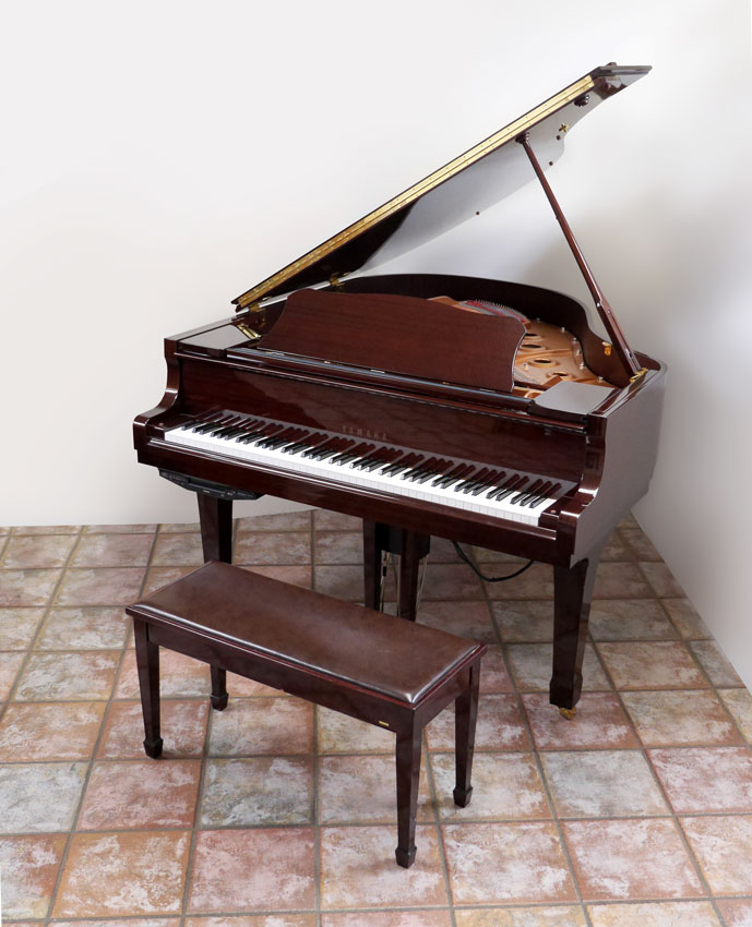 Appraisal: YAMAHA C POLISHED MAHOGANY BABY GRAND PIANO Highly polished mahogany