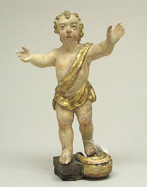 Appraisal: An Italian painted and parcel gilt putto th century Depicted