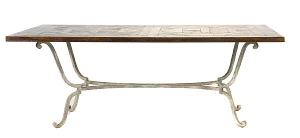 Appraisal: A parquetry and wrought iron dining table height in width