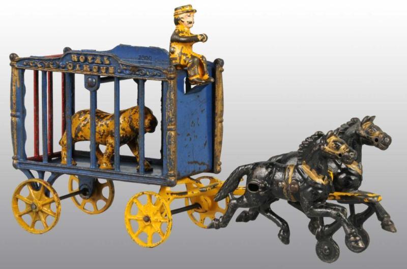 Appraisal: Cast Iron -Horse Royal Circus Cage Wagon Toy Description All