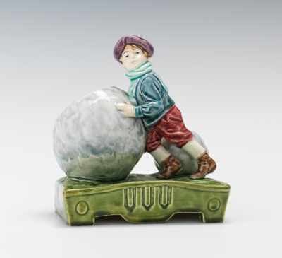 Appraisal: A Majolica Match-Strike of Boy with Snow Ball Figural match