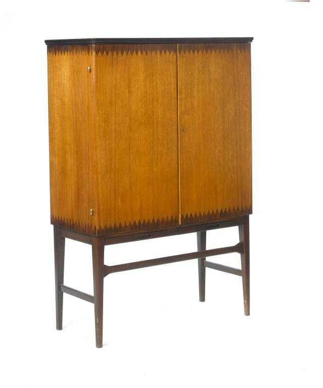 Appraisal: AN ITALIAN ROSEWOOD AND TEAK DRINKS CABINET the fitted interior