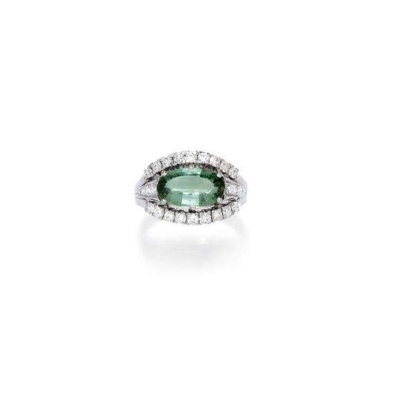 Appraisal: TOURMALINE AND DIAMOND RING ca White gold Classic band ring