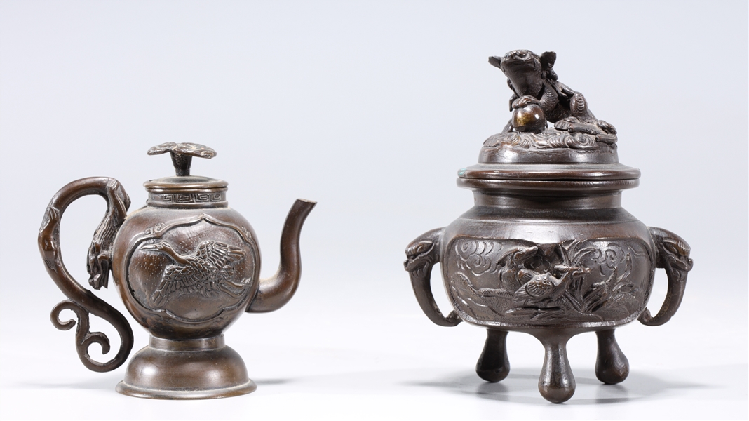 Appraisal: Two Japanese bronzes including tripod covered sensor together with covered