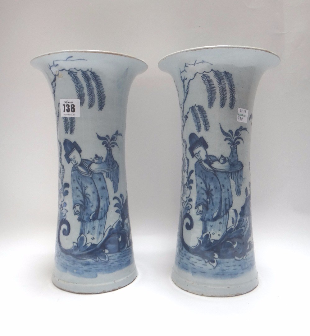 Appraisal: A pair of Dutch Delft blue and white beaker vases