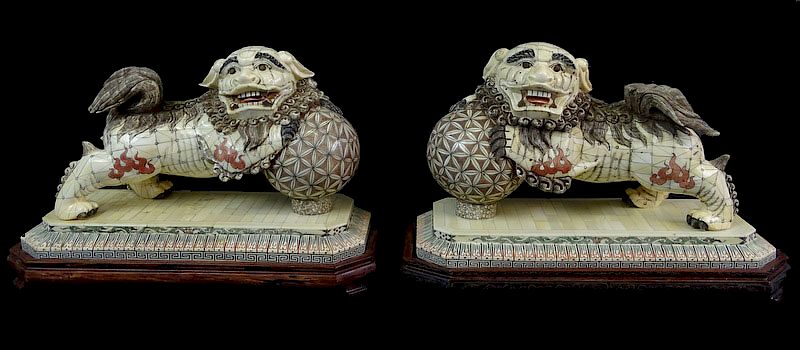 Appraisal: A Pair of Chinese Export Bone Foo Lion Sculptures A