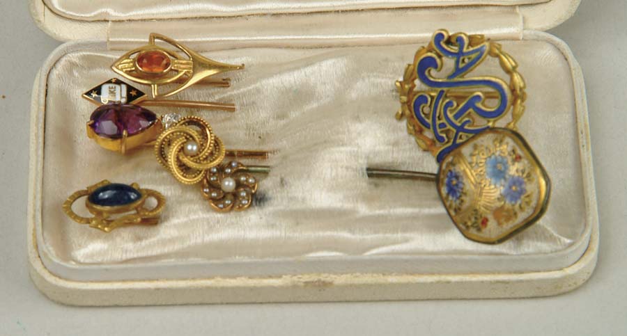 Appraisal: NINE STICK PINS Including enamel ARA Small Satsuma type Knot