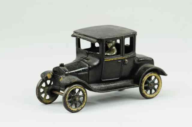 Appraisal: ARCADE MODEL 'T' COUPE Cast iron painted in black gold