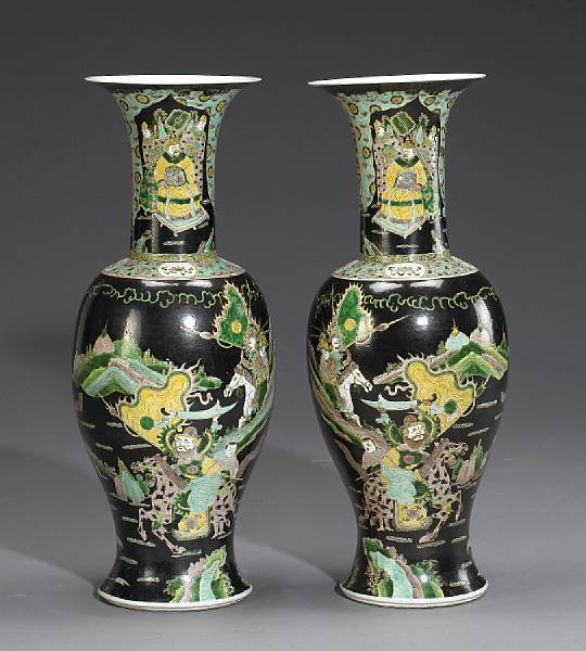 Appraisal: A pair of large noire enameled porcelain trumpet-mouth vases Each