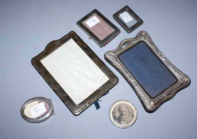 Appraisal: A RECTANGULAR SILVER PORTRAIT FRAME with shaped sides high Birmingham