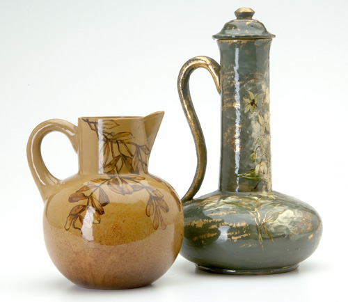 Appraisal: PAULINE Two pitchers painted with branches one brown and one