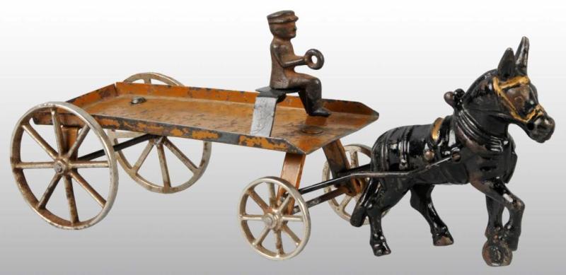 Appraisal: Cast Iron Tin Mule-Drawn Flat Bed Wagon Toy Description Includes