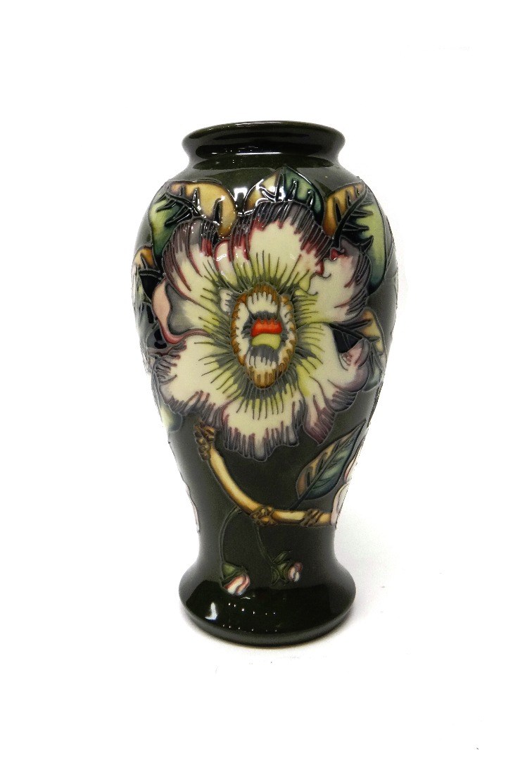 Appraisal: A Moorcroft vase circa decorated with passion flower against a