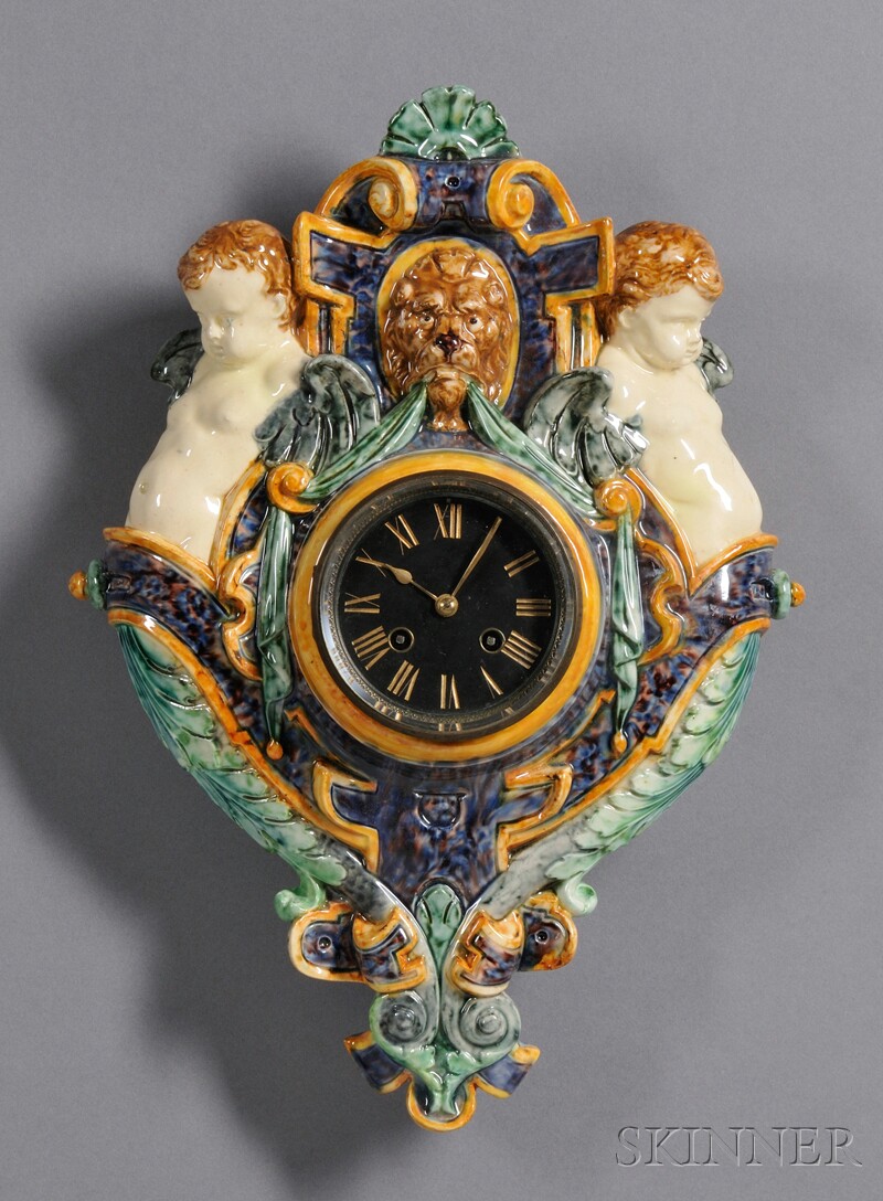 Appraisal: Continental Majolica-mounted Wall Clock c the black marble dial with