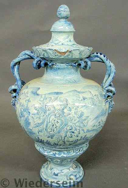 Appraisal: Massive blue and white Italian faience covered urn th c