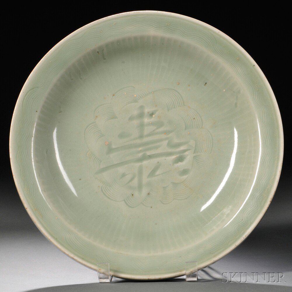 Appraisal: Celadon Dish China decorated with a incised shou character in