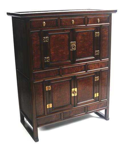 Appraisal: A Korean stained softwood cabinet the moulded rectangular top over