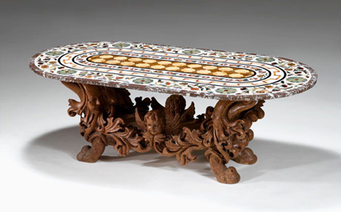 Appraisal: Baroque style marble and pietra dura oval table The ornate