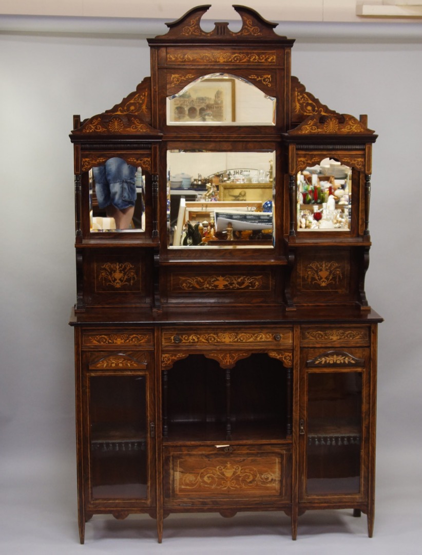 Appraisal: A Victorian rosewood and satinwood inlaid display cabinet the superstructure