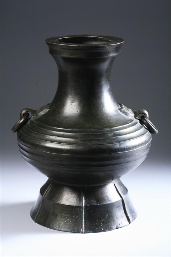 Appraisal: CHINESE BRONZE WINE VESSEL HU Republic period With taotie mask