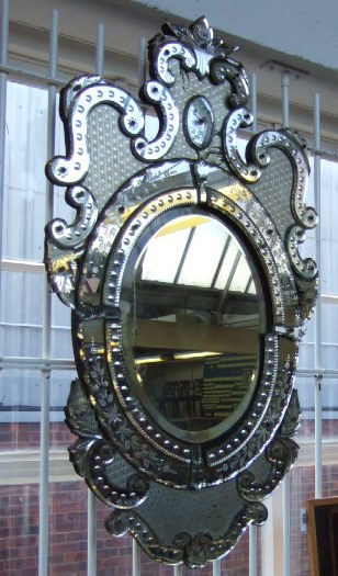 Appraisal: An early th century cut glass Venetian wall mirror with