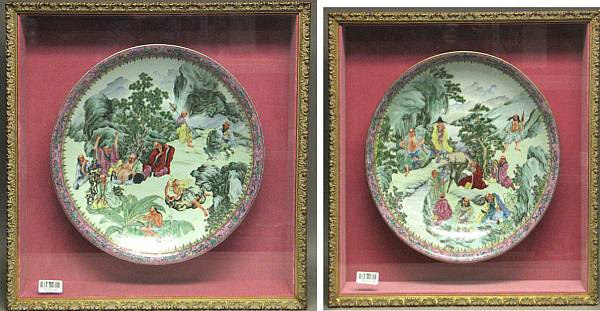 Appraisal: A pair famille rose enameled porcelain chargers Painted with eighteen