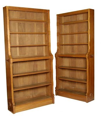 Appraisal: Two late Victorian walnut open waterfall bookcases each with chamfered