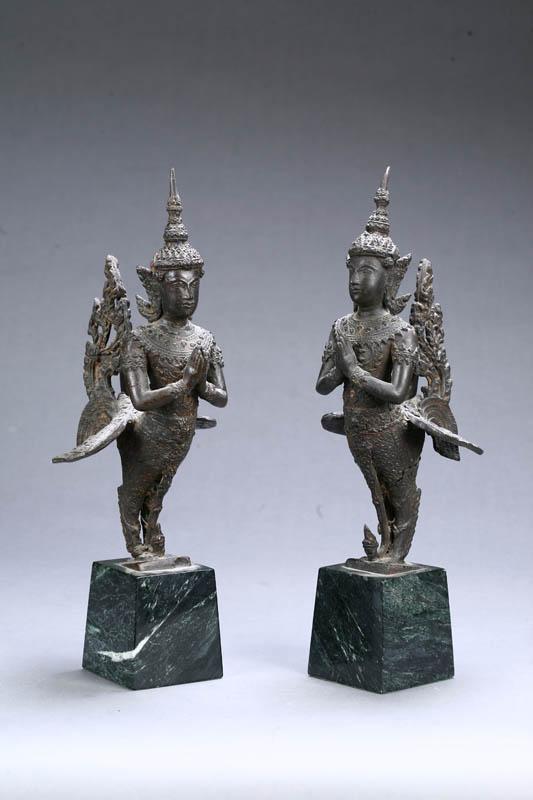 Appraisal: PAIR OF MYTHICAL HALF-BIRD FIGURES Indonesian th century bronze Cast