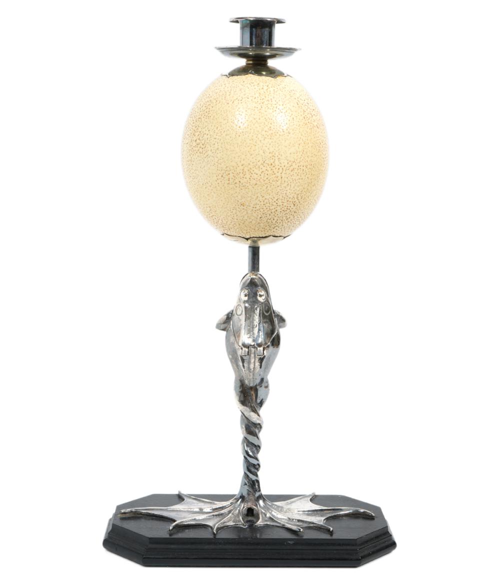 Appraisal: REDMILE SILVERPLATE FROG OSTRICH EGG CANDLESTICKAnthony Redmile silverplate figural frog