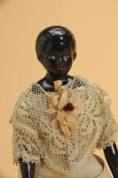 Appraisal: All Original Black China Head Doll Germany ca a finely