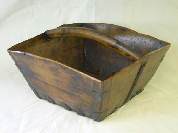 Appraisal: Provincial Wrought-Iron-Mounted Flaring Wooden Grain Basket with gently arched stationary