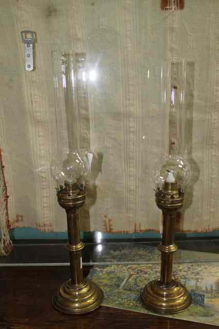 Appraisal: A PAIR OF EARLY TH CENTURY BRASS CANDLE LANTERNS with