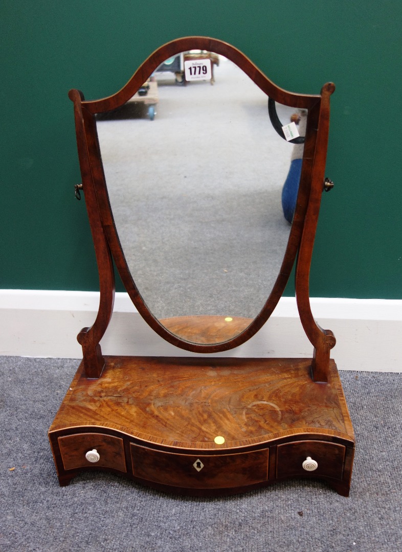 Appraisal: A George III tulipwood banded mahogany toilet mirror with shield