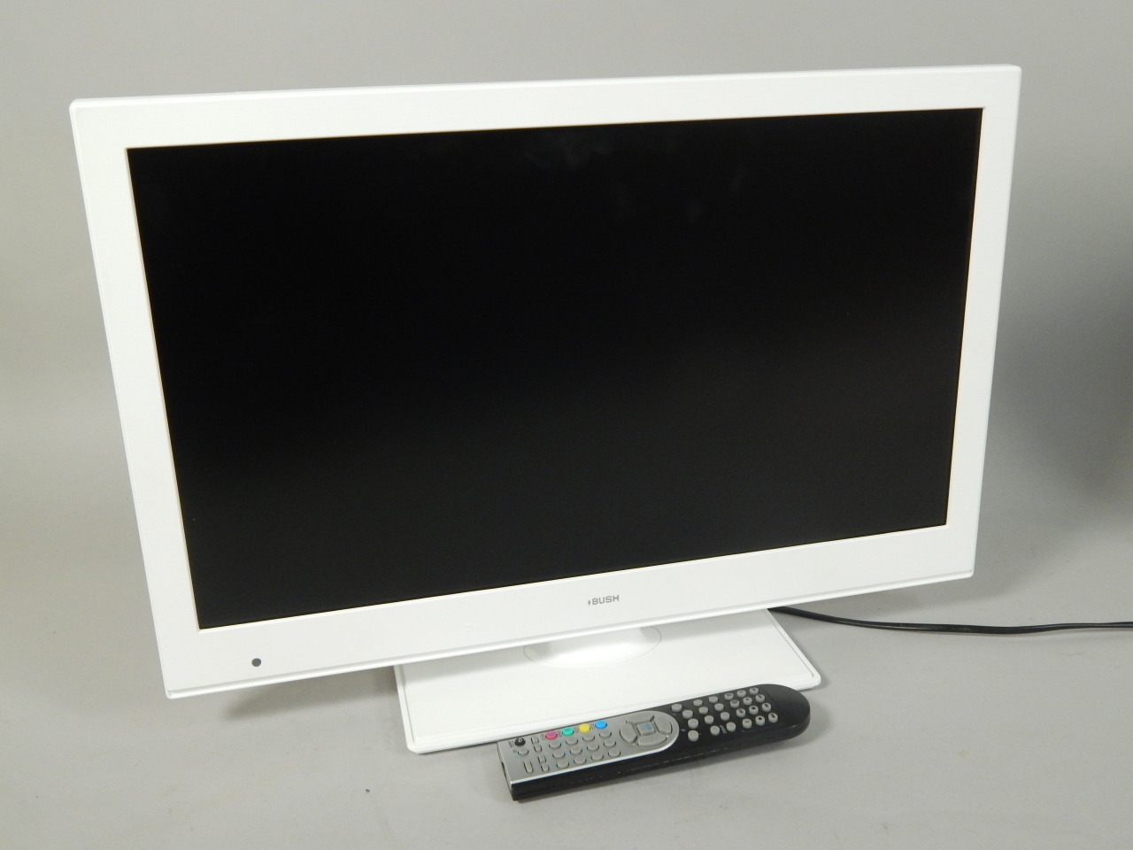 Appraisal: A Bush white LCD TV with combined DVD player boxed