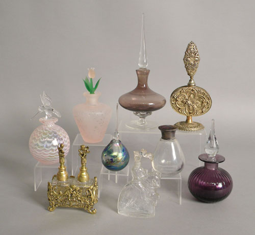 Appraisal: Group of nine perfume bottle and atomizers th c tallest