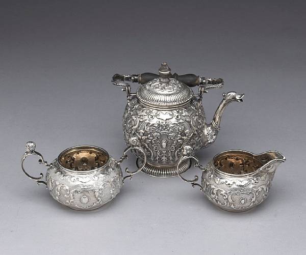 Appraisal: A Dutch export standard silver and wood teapot after the