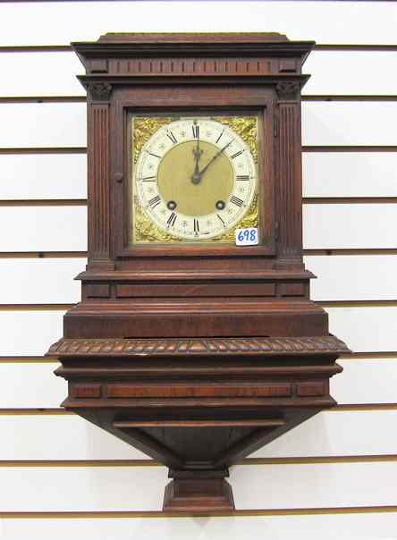 Appraisal: GERMAN OAK CASE BRACKET CLOCK AND WALL BRACKET Lenzkirch Clock