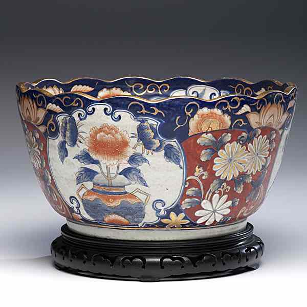 Appraisal: Japanese Imari Punch Bowl Japan An unmarked heavily potted Imari