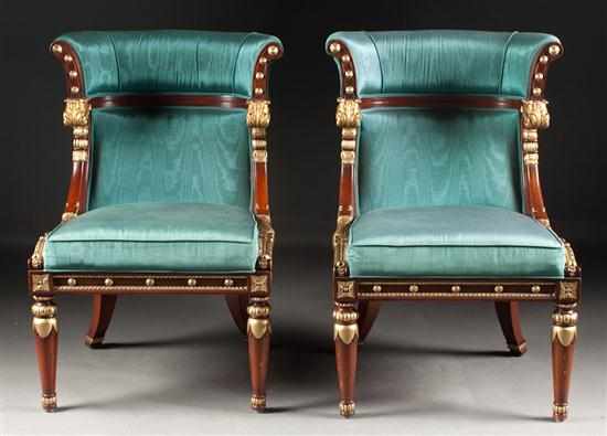 Appraisal: Pair of Regency style carved mahogany parcel-gilt upholstered chairs in