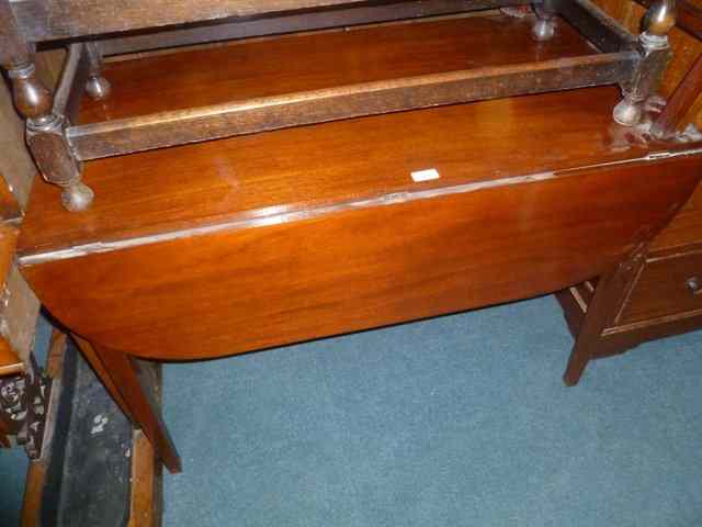 Appraisal: A TH CENTURY MAHOGANY PEMBROKE TABLE fitted with D end