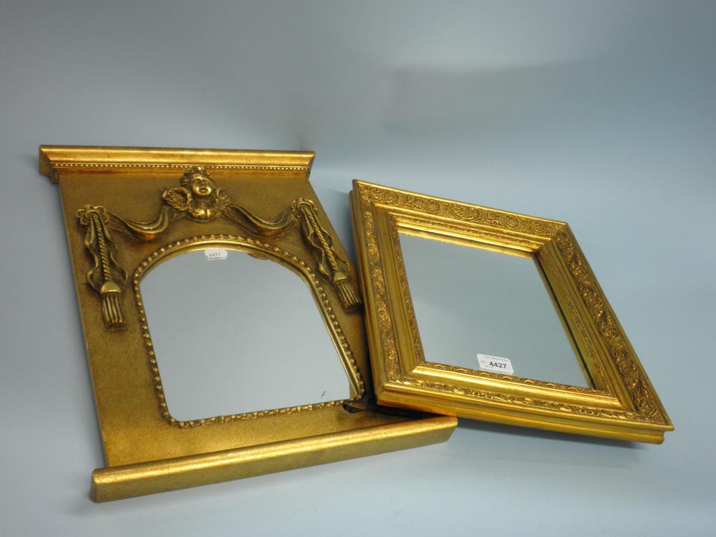 Appraisal: A reproduction gilt wall mirror - cherub mask and another