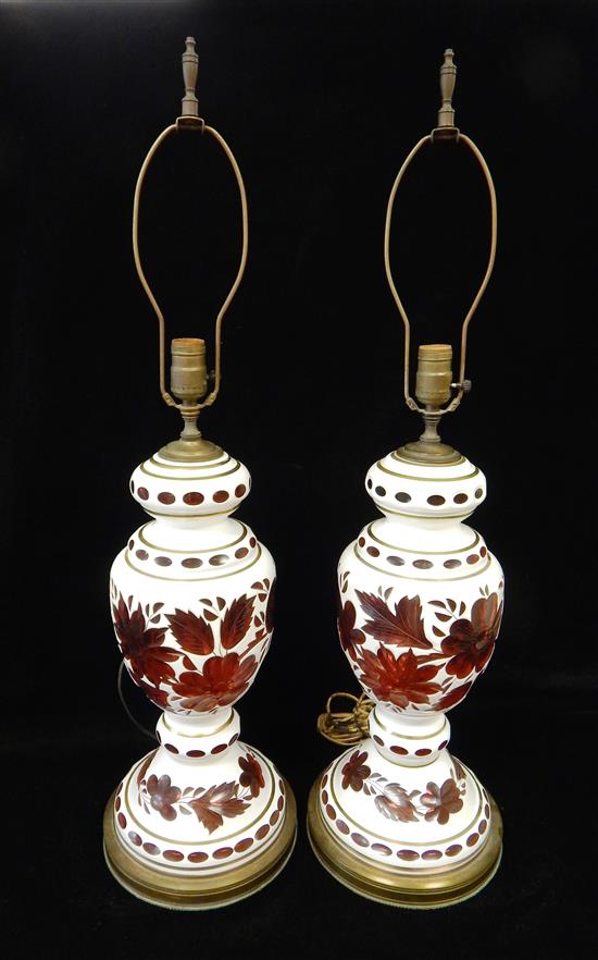 Appraisal: Lamps pair of white cut to cranberry glass lamps electrified