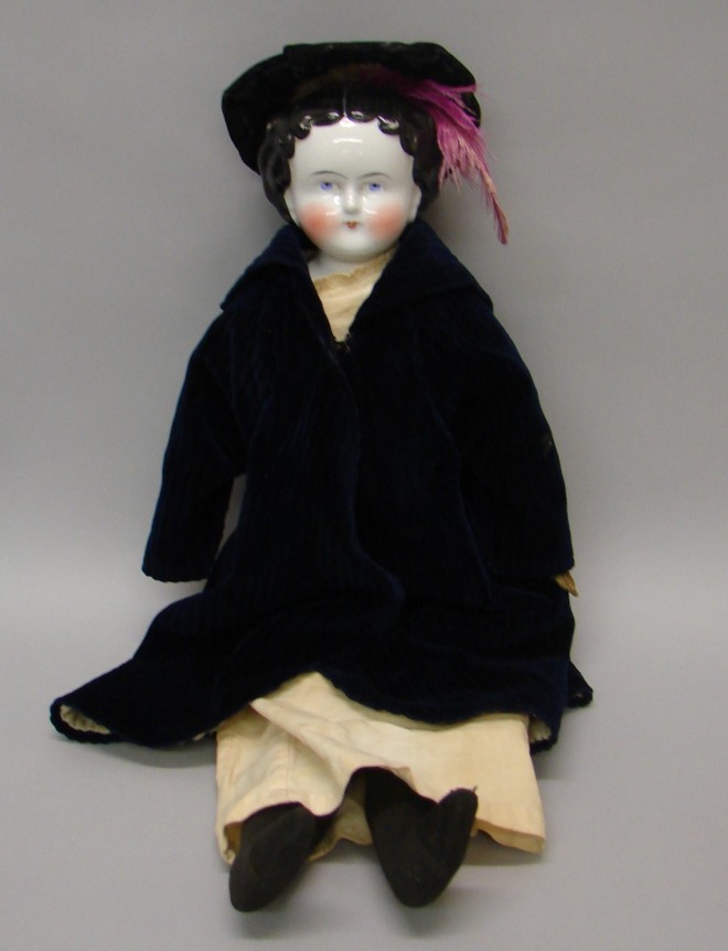 Appraisal: 's Flat top china doll with black hair blue eyes