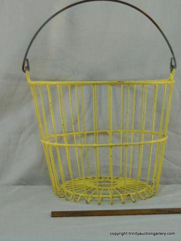 Appraisal: Vintage Yellow Covered Wire Egg Basket with wire bail handle