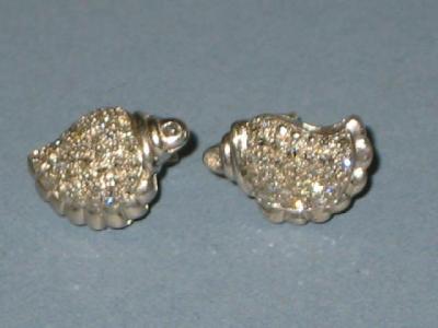 Appraisal: A PAIR OF DIAMOND EAR STUDS modelled as diamond encrusted