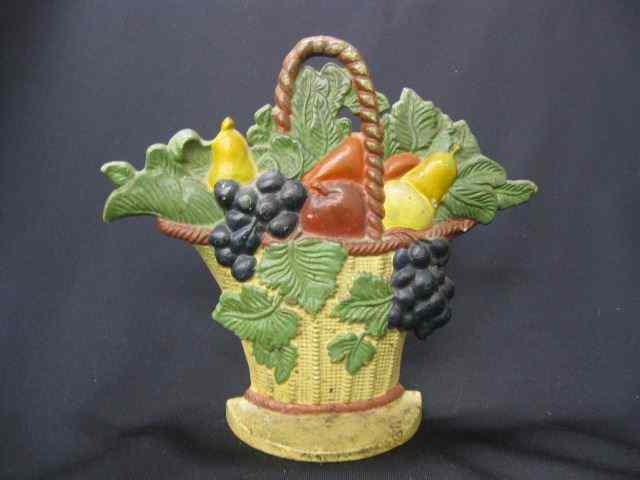 Appraisal: Cast Iron Figural Doorstop Basket of Fruitand berries '' tall