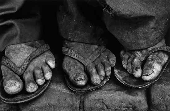 Appraisal: Sebastiao Salgado b Feet Brazil Gelatin silver print photographer's embossed